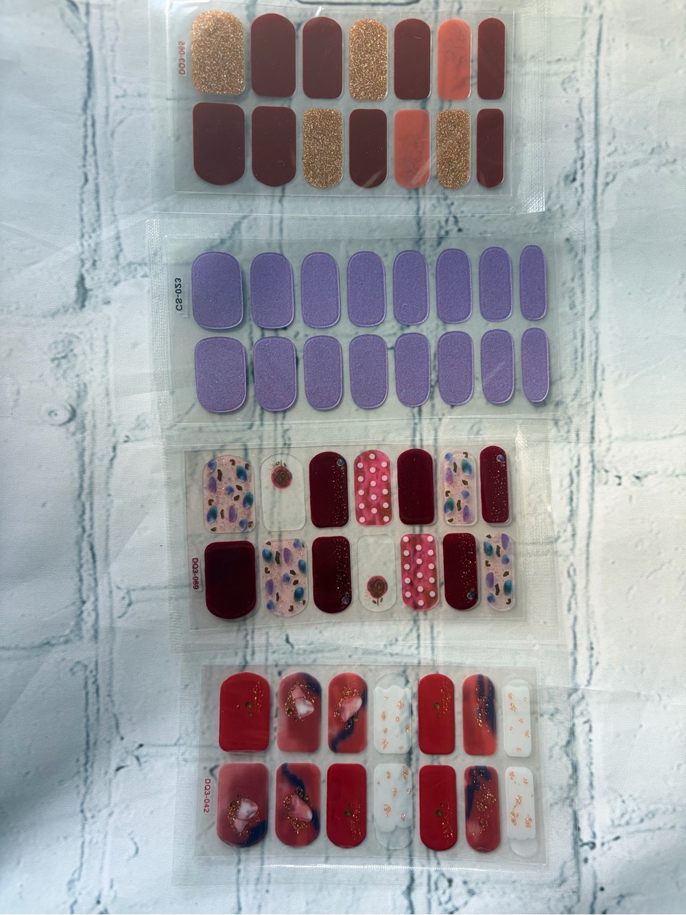 4 Pack of Nail Wrap Sticker Set - Assorted Purple, Red, Pink, White Women Set.
